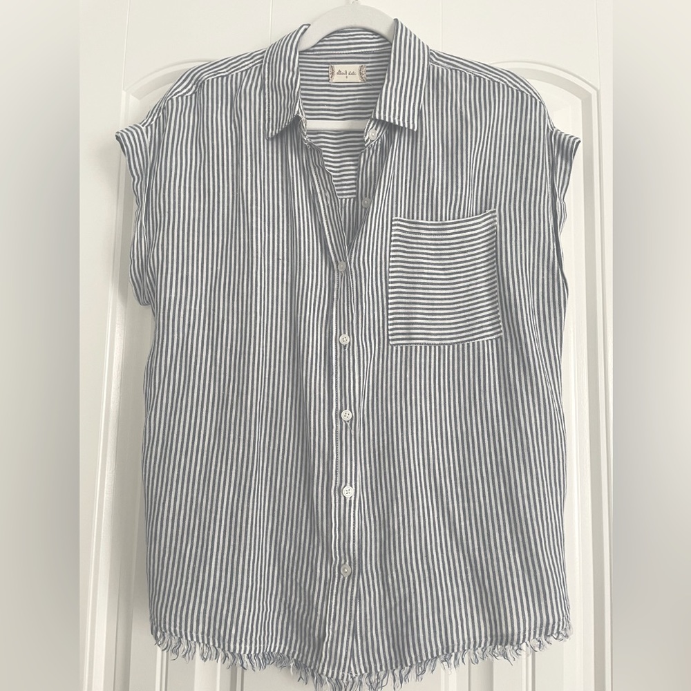 Striped buttoned up short sleeve top.